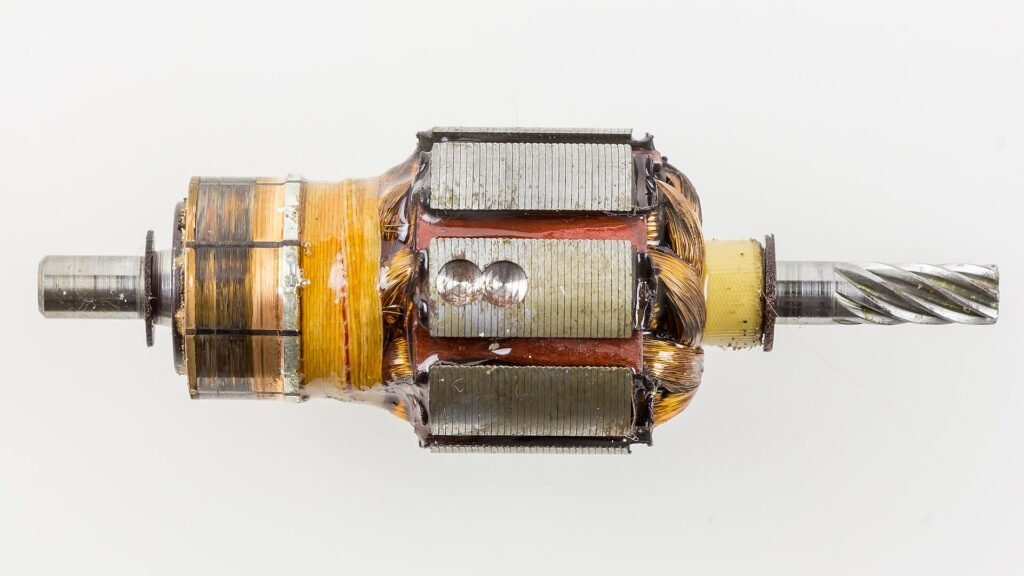 Motor rotor with balancing holes